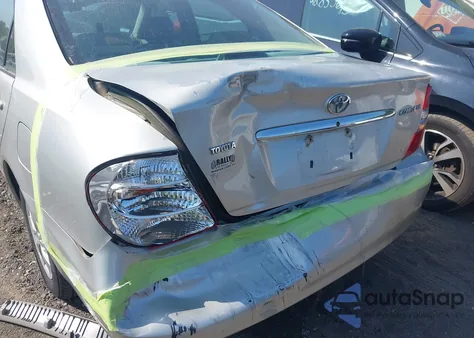 2002 Toyota Camry Le from USA, damaged, VIN 4T1BE32K42U504553